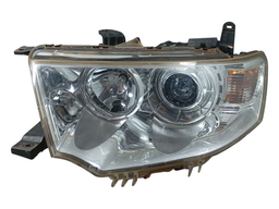 FAROL ESQUERDO TRITON PAJERO DAKAR 2010 A 2018 C/ PROJETOR