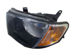 FAROL ESQUERDO L200 TRITON 2008 A 2017 PISCA AMBAR