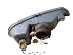 FAROL ESQUERDO CELTA 2001 2002 2003 2004 A 2006