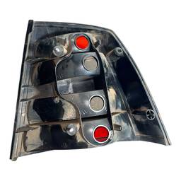 LANTERNA TRASEIRA ESQUERDA ASTRA HATCH 2003 A 2012 BICOLOR