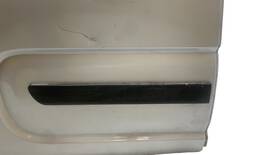 PORTA TRASEIRA DIREITA UNO 2011 A 2021 S/ FURO MOLDUR