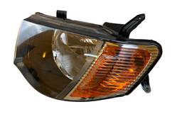 FAROL ESQUERDO L200 TRITON 2008 2009 A 2017 PISCA AMBAR