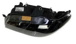 FAROL ESQUERDO PALIO G3 04/17 STRADA SIENA 05/12 MASC NEGRA