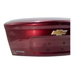 TAMPA TRASEIRA CORSA CLASSIC 2005/10 FURO CILINDRO LADO DIR