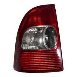 LANTERNA TRASEIRA ESQUERDA STRADA 2001 A 2004 FUME