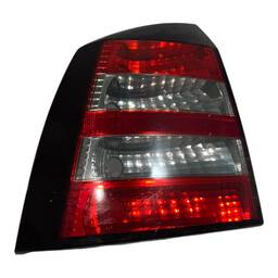 LANTERNA TRASEIRA ESQUERDA ASTRA HATCH 2003 A 2012 BICOLOR