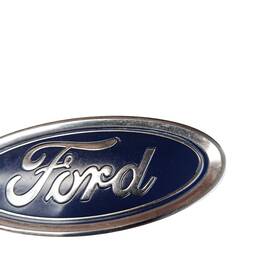 EMBLEMA NEW FIESTA  PARA-CHOQUE DIANTEIRO 