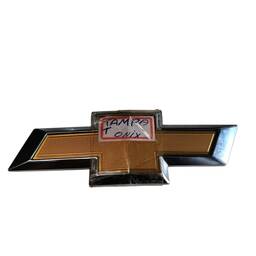 EMBLEMA TAMPA TRASEIRA ONIX GM