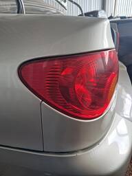 Lanterna Tras Esq Corolla 2003 a 2008 (canto) Pisca Ambar