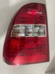 LANTERNA TRASEIRA ESQUERDA SPORTAGE 2006 A 2010