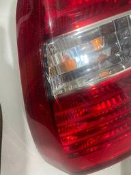 LANTERNA TRASEIRA ESQUERDA SPORTAGE 2006 A 2010