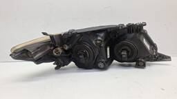 FAROL ESQUERDO COROLLA 2009 A 2011