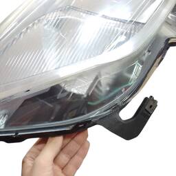 FAROL DIREITO AGILE 10/13 MONTANA 2011/2021 CROMADO AVARIA