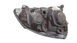 FAROL ESQUERDO CLIO 2004 A 2012 MASC NEGRA (AVARIA)