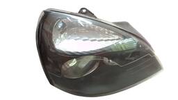 FAROL DIREITO CLIO 2004 A 2012 MASC NEGRA AVARIA 