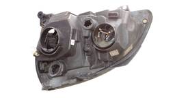 FAROL DIREITO CLIO 2004 A 2012 MASC NEGRA AVARIA 