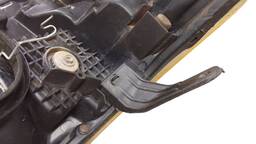 FAROL ESQUERDO HILUX 2012 2013 A 2015 LENTE AMARELADA 