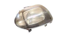 Farol Direito Clio 2000 a 2002 (Lente amarelada) 