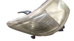 FAROL DIREITO HILUX 2012/2015 MÁSCARA NEGRA (LENTE AMARELA) 