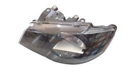 FAROL ESQUERDO GOLF 2008/2013 MASC NEGRA (RECUPERADO)