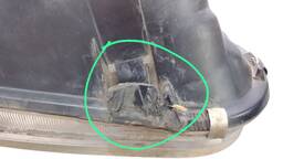 FAROL ESQUERDO GOLF 1999 A 2007 C/ AUX AVARIA 