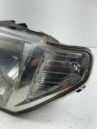 FAROL ESQUERDO PAJERO TR4 2003 À 2006