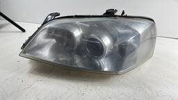 FAROL ESQUERDO GM ASTRA 2003 À 2011