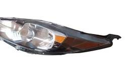 FAROL ESQUERDO NEW FIESTA 2014 2015 A 2019 FUMÊ