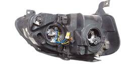 FAROL ESQUERDO FOX SPACE 2006 A 2010 FOCO DUPLO MASC NEGRA