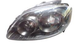 FAROL ESQUERDO FOX SPACE 2006 A 2010 FOCO DUPLO MASC NEGRA