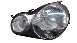 FAROL ESQUERDO POLO 2003 2004 A 2006 CROMADO