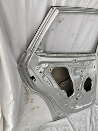 PORTA TRASEIRA ESQUERDA TRACKER 2020 2022 2023/..AVARIA 