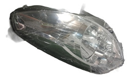 FAROL MANUAL CROMADO LADO ESQUERDO SANDERO 2012 ATÉ 2014