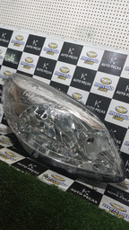 FAROL SANDERO 2012/2014 FAROL MANUAL CROMADO LADO DIREITO 