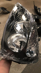 FAROL DIANTEIRO ESQUERDO CLIO ATÉ 2012 MASCARA CINZA 