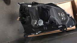 FAROL DIANTEIRO ESQUERDO CLIO ATÉ 2012 MASCARA CINZA 