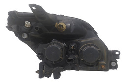 FAROL DIANTEIRO ESQUERDO RENAULT SCENIC MASCARA NEGRA 2006