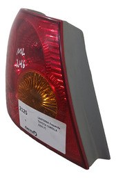 LANTERNA TRASEIRA CANTO LE TOYOTA COROLLA 2006 USADA