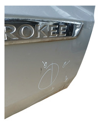 PORTA DIANTEIRA DIREITA GRAND CHEROKEE 11/15 COM DETALHE