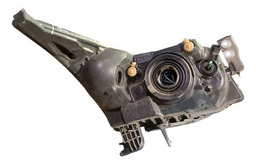 FAROL LADO ESQUERDO CRUZE 2012 A 2016 DETALHE