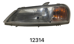 Farol Dianteiro Esquerdo Chevrolet Celta 2001/06 1100093 Esquerdo