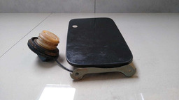 TAMPA PORTINHOLA NISSAN LIVINA 2009 A 2013