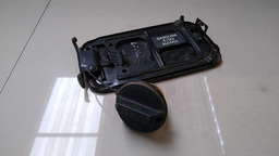 TAMPA PORTINHOLA NISSAN LIVINA 2009 A 2013