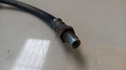 FLEXÍVEL FREIO DIANTEIRO DIREITO GM ONIX 1.4 2013 2014