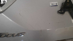 TAMPA TRASEIRA FORD FOCUS 2014 A 2017 COM DETALHE CINZA