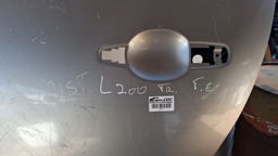 PORTA TRASEIRA ESQUERDA TRITON 2008 A 2017 C/DETALHE