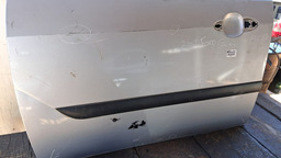 PORTA DIANTEIRA ESQUERDA FOCUS 2001 A 2009 C/DETALHE